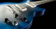 Gitarowy robot Gibsona. Na pierwszym planie: pokrętło do wyboru trybu pracy urządzenia. © Gibson